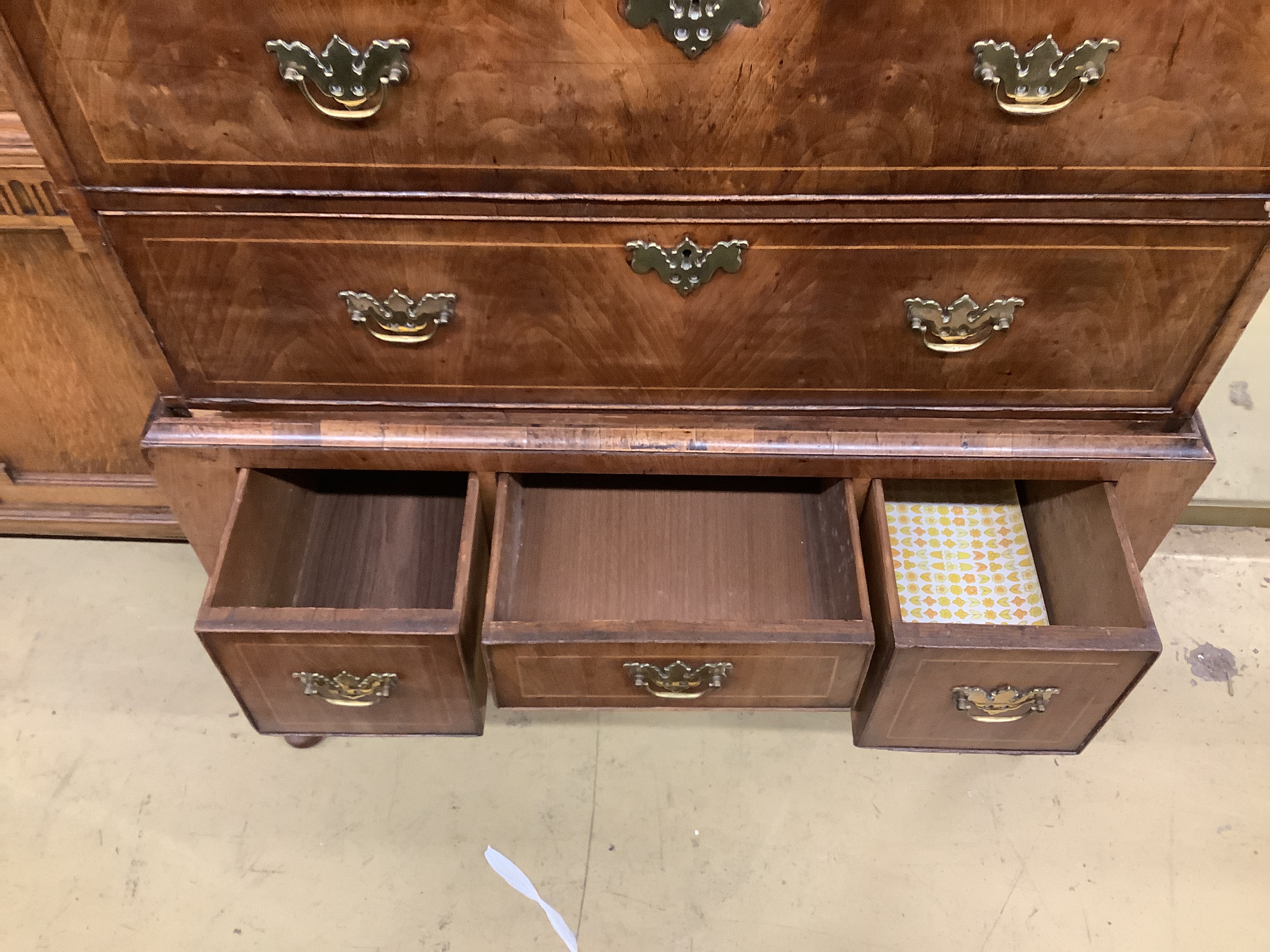 An 18th century walnut chest on stand, width 97cm, depth 56cm, height 146cm